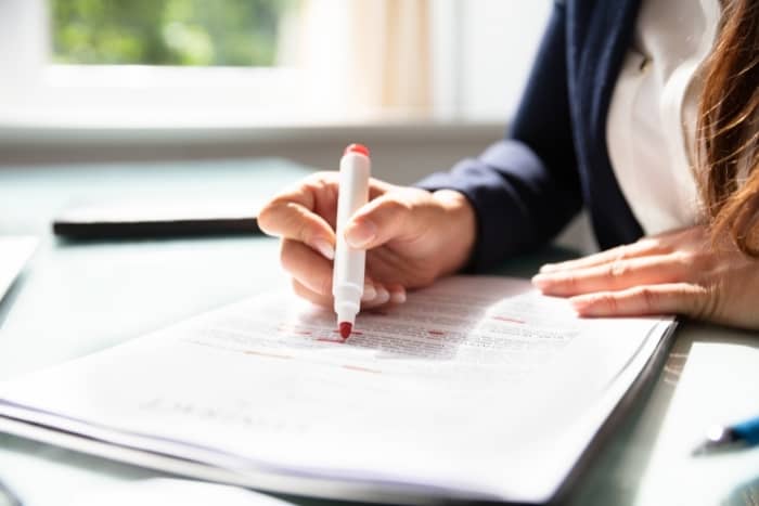 writing skills woman editing document