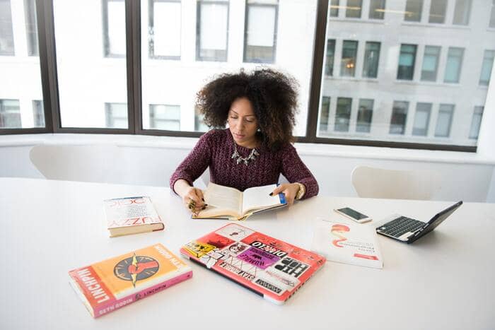 writing skills woman reading books