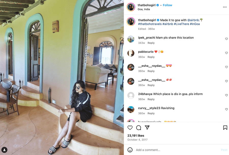 Instagram photo of woman in a colorful AirBNB promoting the company as an influencer